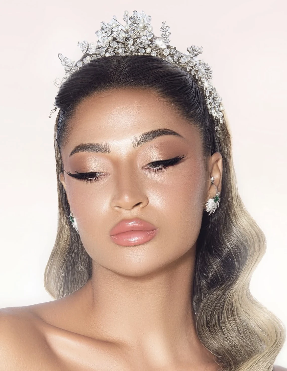 A softly defined bridal look with fresh, luminous skin.
